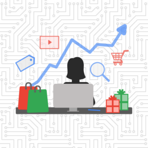 Person using desktop surrounded by presents with a line graph and ppc icons in the background