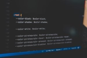 white web development code text on a black background